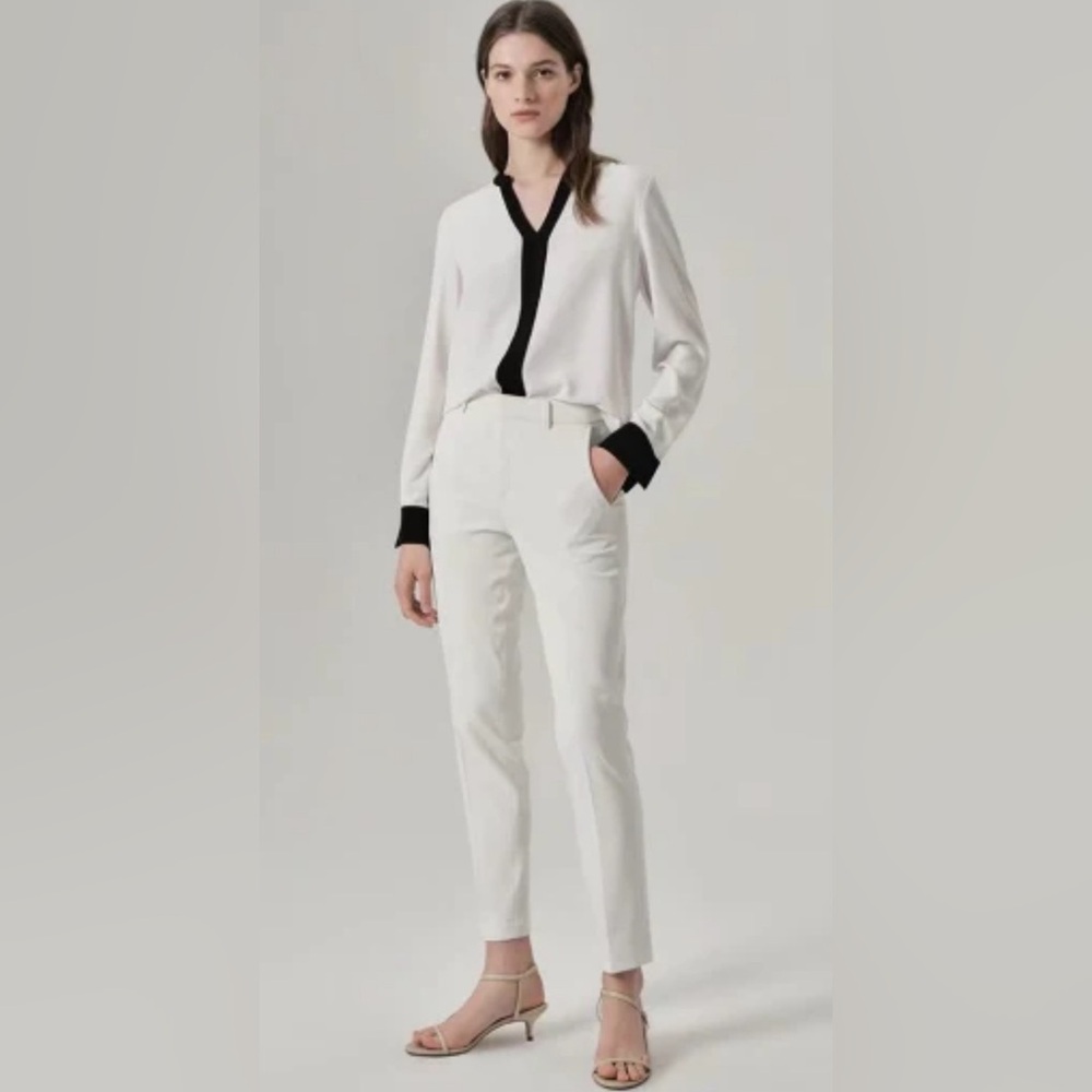 Preowned white and black blouse by Calvin Klein